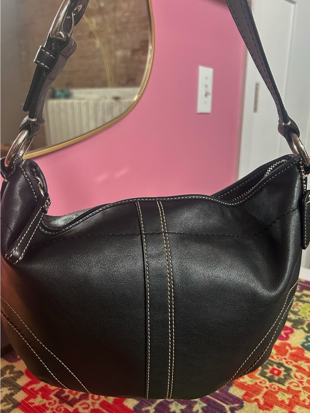 black leather Coach shoulder bag